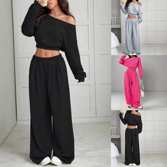 Traje de pantalón informal de color liso con hombros descubiertos y corte entallado